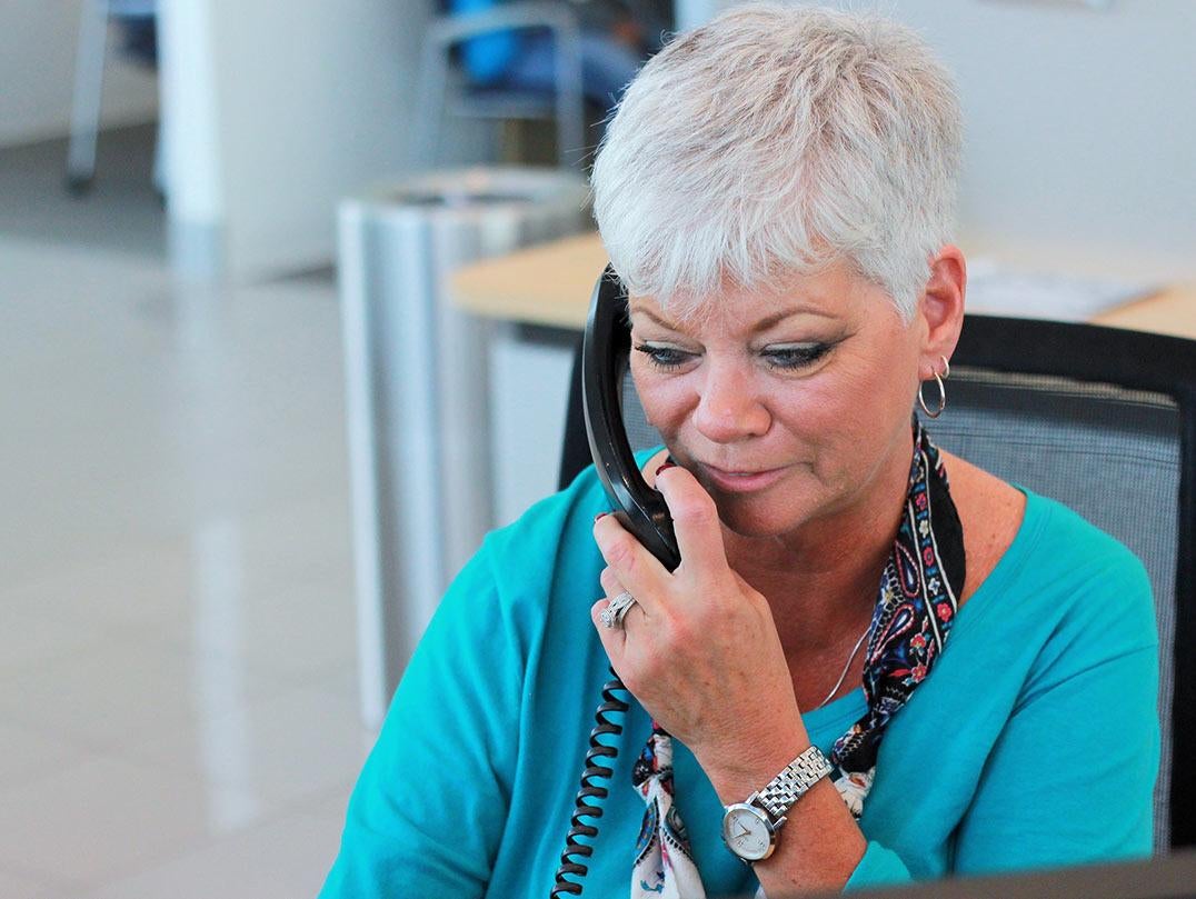 image of a woman on a phone